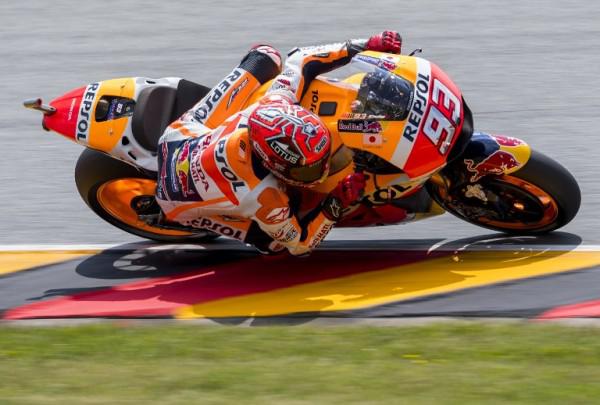 Honda rider Marc Marquez of Spain competes during the qualifying of the Moto GP of the Grand Prix of Germany at the Sachsenring Circuit on July 16, 2016 in Hohenstein-Ernstthal, eastern Germany. / AFP PHOTO / Robert MICHAEL