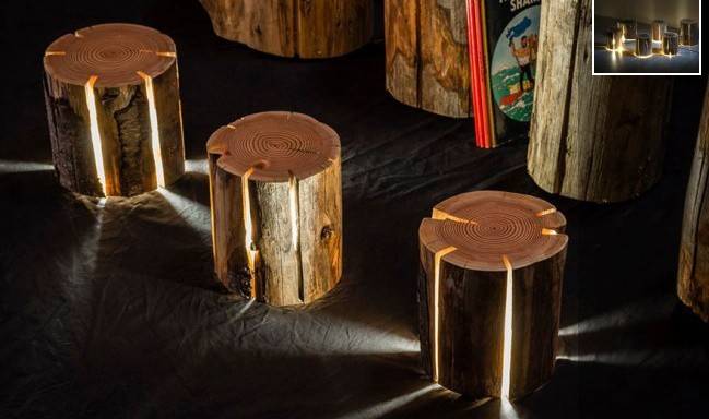 Las lámparas hechas de tronco de árbol, cuyas grietas dejan pasar la luz, fueron hechas por Duncan Meerding