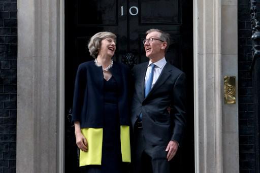 Theresa May junto a su esposo Philip John May / Foto: AFP