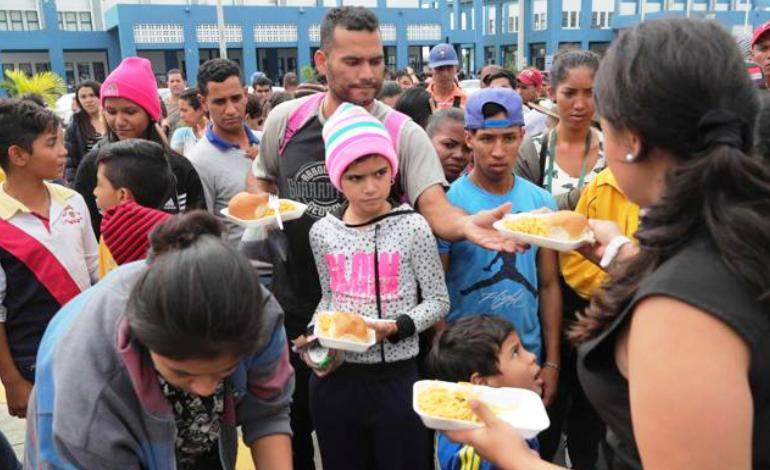Deficiente alimentación de venezolanos en Colombia y Ecuador
